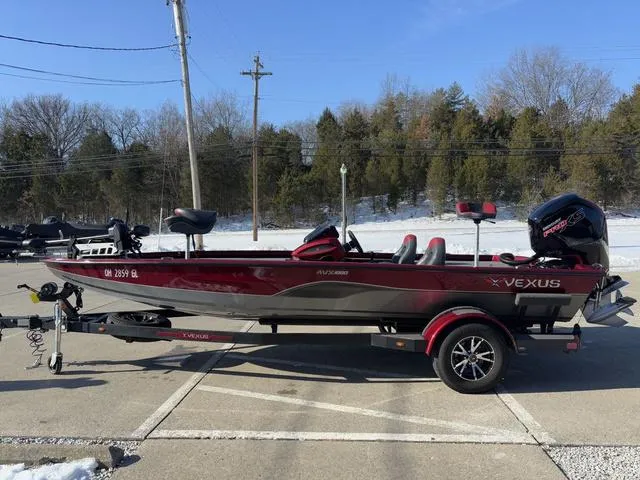 Slide: The Image of 2022 Venus AVX 1880 boat on trailer, parked outdoors in a snowy setting. - 13