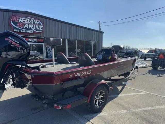 Slide: The Image of 2022 Venus AVX 1880 boat at Wieda's Marine dealership, featuring sleek design and Mercury engine. - 3