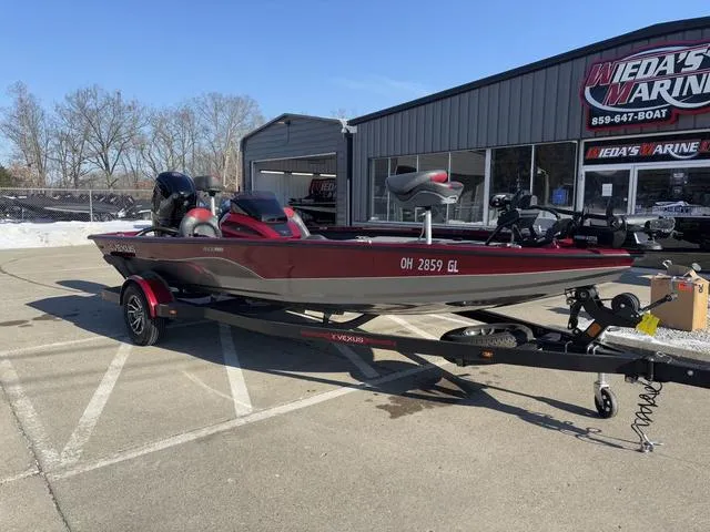 Slide: The Image of 2022 Venus AVX 1880 boat on trailer outside dealership, sunny day. - 7