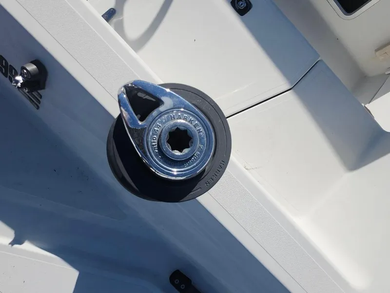 Slide: The Image of Winch on a C&C 99 sailboat, 2002 model, with a sleek metallic finish. - 20