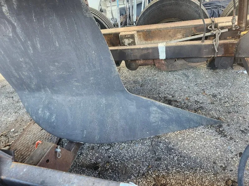 Slide: The Image of Rusty metal structure with a curved blade, C&C 99 model, 2002. - 36