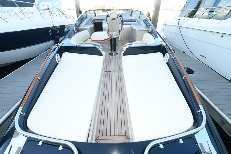 Slide: The Image of 2012 Riva Rivarama luxury yacht with spacious deck and elegant seating. - 15