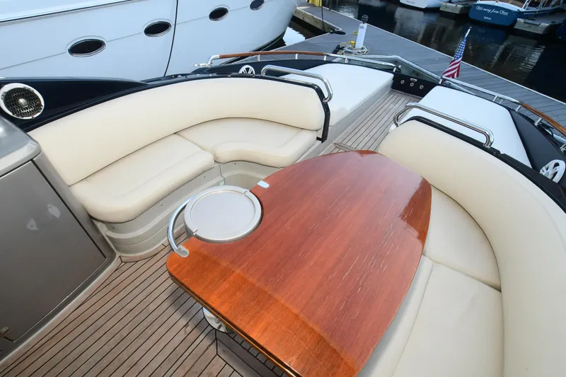 Slide: The Image of Luxurious 2012 Riva Rivarama yacht interior with elegant seating and polished wooden table. - 18
