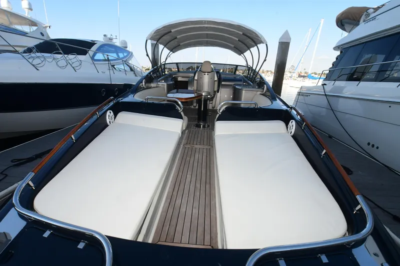 Slide: The Image of 2012 Riva Rivarama luxury yacht with spacious deck and elegant seating. - 19