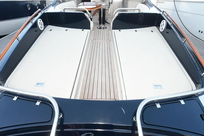 Slide: The Image of 2012 Riva Rivarama luxury yacht deck with sleek design and spacious seating. - 20
