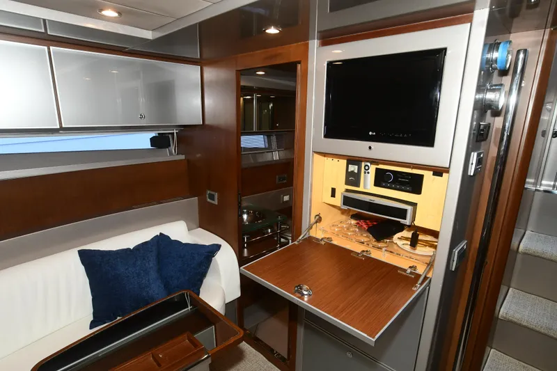 Slide: The Image of Luxurious interior of a 2012 Riva Rivarama yacht with modern amenities and elegant design. - 23