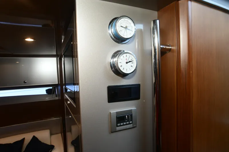 Slide: The Image of Interior of 2012 Riva Rivarama yacht with gauges and control panel. - 25