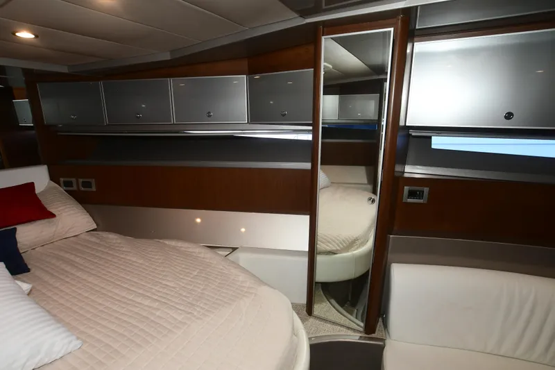 Slide: The Image of Luxurious interior of a 2012 Riva Rivarama yacht with elegant wood and modern design. - 29