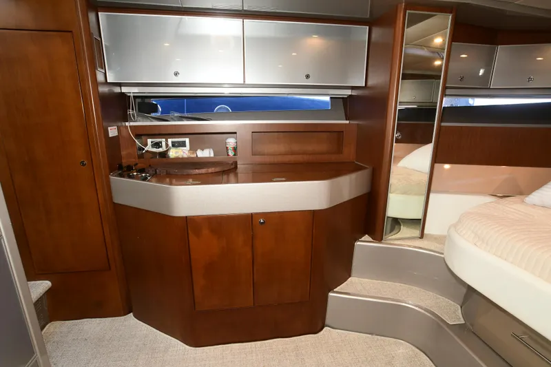 Slide: The Image of Luxurious 2012 Riva Rivarama yacht interior with elegant wood cabinetry and modern design. - 31