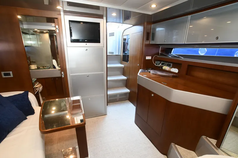 Slide: The Image of Luxurious 2012 Riva Rivarama yacht interior with modern amenities and elegant wood finishes. - 33
