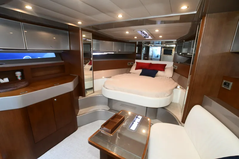 Slide: The Image of Luxurious 2012 Riva Rivarama yacht interior with elegant wood finishes and modern amenities. - 34