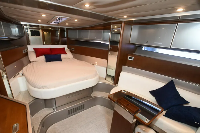 Slide: The Image of Luxurious interior of a 2012 Riva Rivarama yacht with elegant wood finishes. - 38