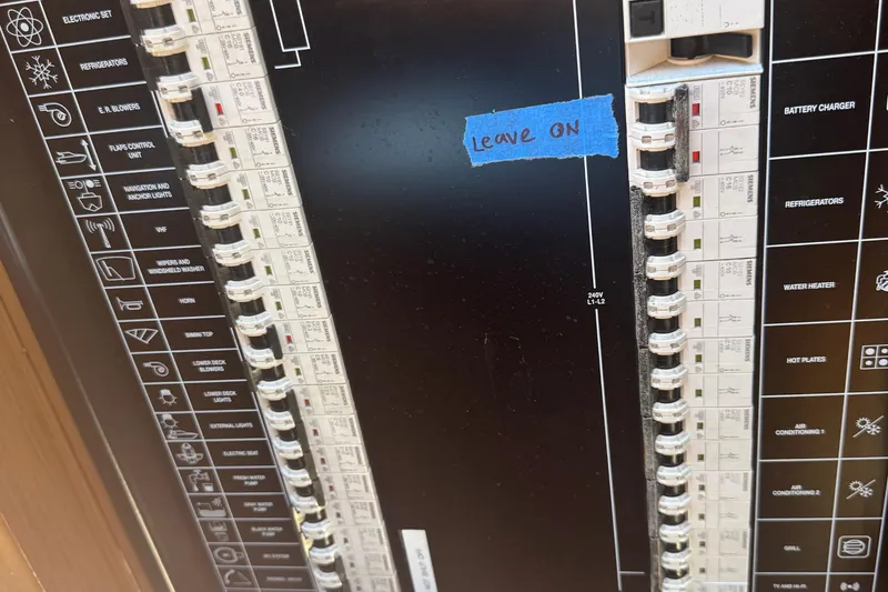 Slide: The Image of Electrical panel of a 2012 Riva Rivarama boat with labeled switches and "Leave On" note. - 46
