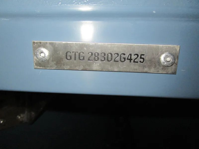 Slide: The Image of Metallic identification plate on NX Boats N280 XTREME 2025, displaying serial number GTG 28302G425. - 20