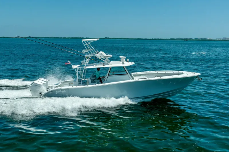 Slide: The Image of 2023 Yellowfin 42 Offshore boat cruising on open water. - 2
