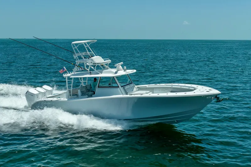 Slide: The Image of 2023 Yellowfin 42 Offshore boat cruising on open water. - 24