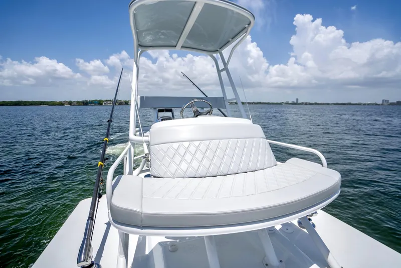 Slide: The Image of 2023 Yellowfin 42 Offshore boat on water, featuring sleek design and comfortable seating. - 46