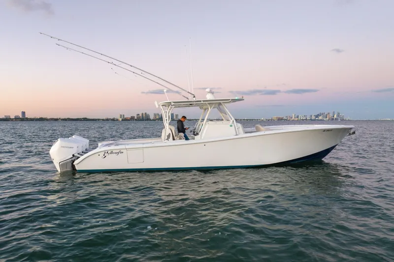 The Image of 2016 Yellowfin 39 Offshore boat cruising on calm waters at sunset. - 0