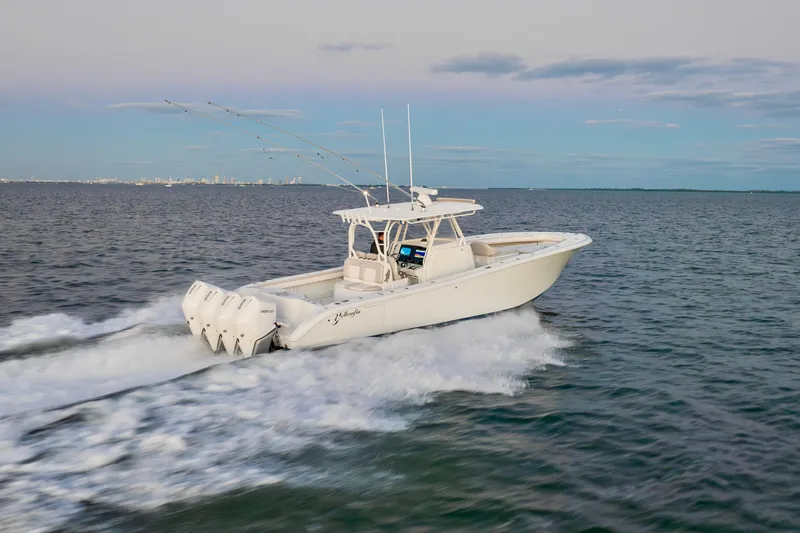 Slide: The Image of 2016 Yellowfin 39 Offshore boat cruising on open water. - 15