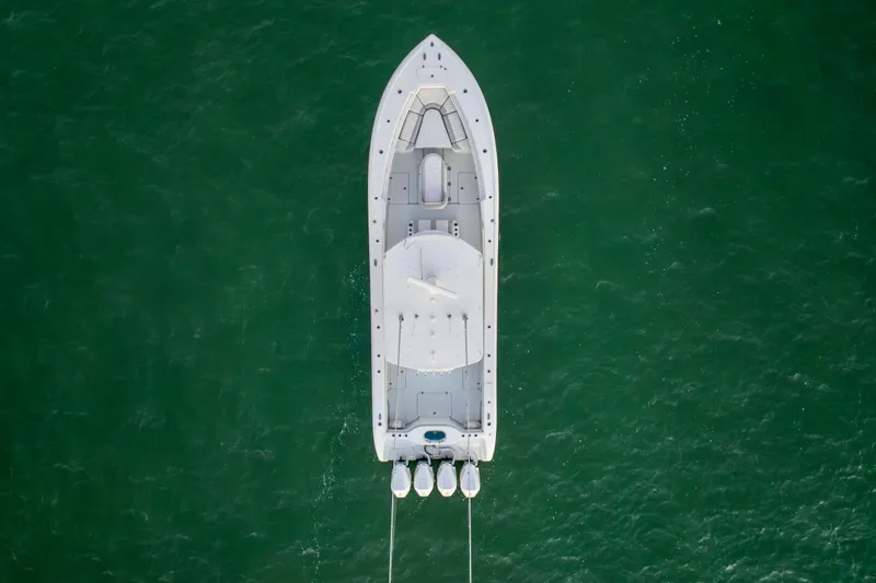 Slide: The Image of Aerial view of 2016 Yellowfin 39 Offshore boat on green water. - 17