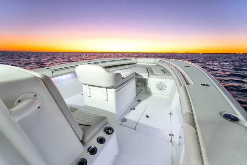 Slide: The Image of 2016 Yellowfin 39 Offshore boat at sunset on the ocean. - 27