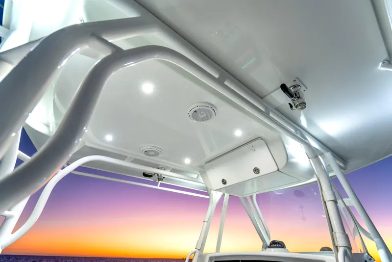 Slide: The Image of 2016 Yellowfin 39 Offshore boat canopy with lights at sunset. - 38