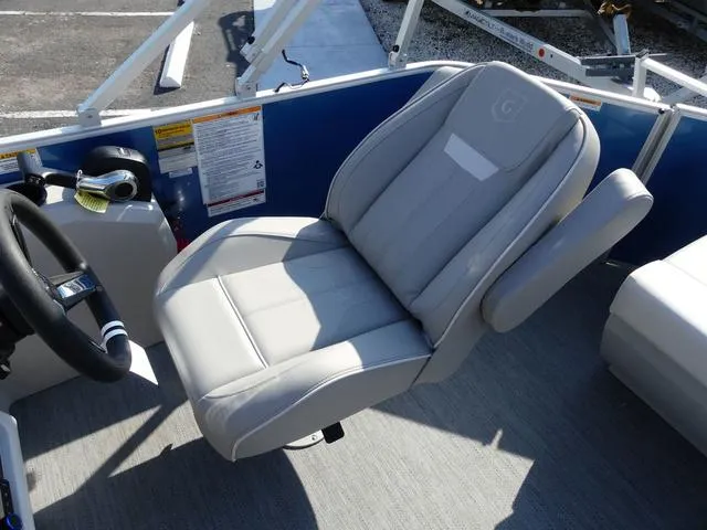 Slide: The Image of Captain's seat of 2025 Godfrey Pontoons Xperience 1886 CX boat. - 8