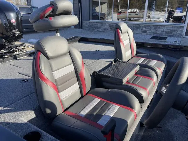 Slide: The Image of 2023 Ranger RT188 boat interior with gray and red seats, featuring a modern design. - 5