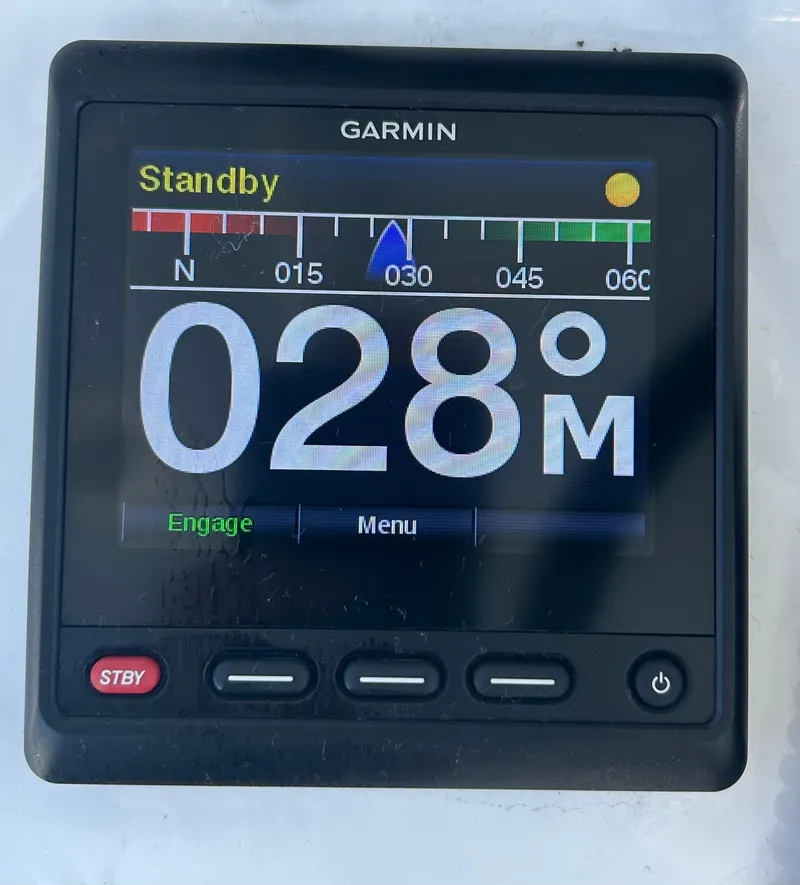 Slide: The Image of Garmin marine display showing compass heading on a 2022 Contender 35 ST boat. - 29