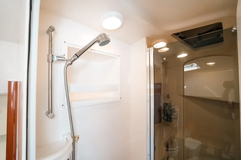 Slide: The Image of Interior shower of 2009 Intrepid 475 Sport Yacht, featuring modern fixtures and lighting. - 44