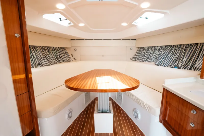 Slide: The Image of Luxurious interior of 2009 Intrepid 475 Sport Yacht with elegant wood finishes. - 45