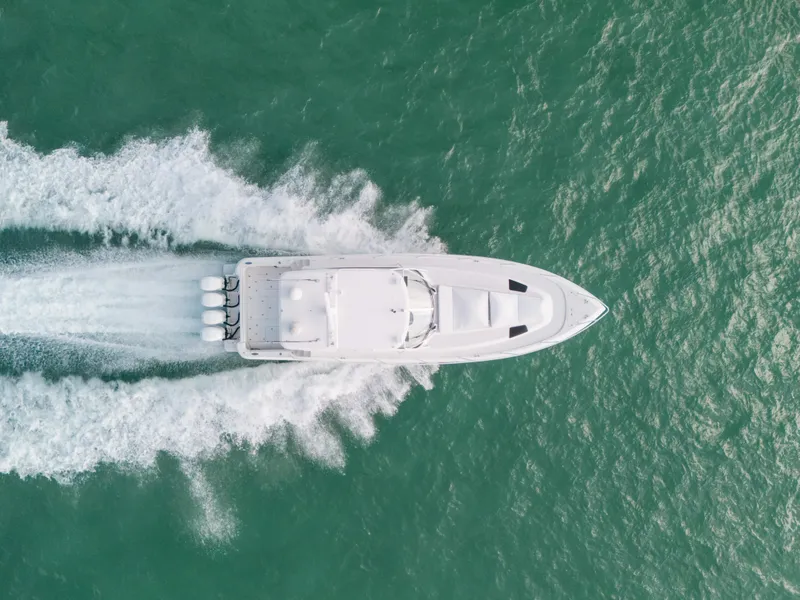 Slide: The Image of Aerial view of 2009 Intrepid 475 Sport Yacht cruising on open water. - 8
