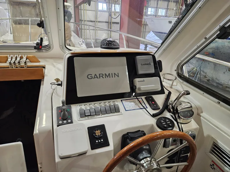 Slide: The Image of Helm of 2012 Back Cove 30 boat with Garmin navigation system. - 11