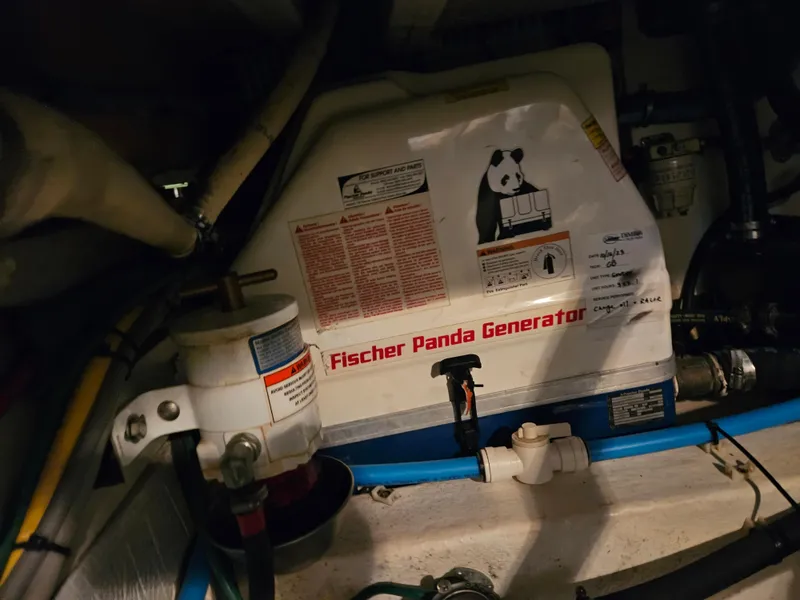 Slide: The Image of Fischer Panda generator in a 2012 Back Cove 30 boat engine compartment. - 24