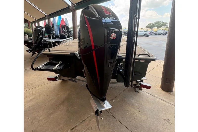 Slide: The Image of The image shows a 2025 Mako 18 Pro Skiff Backwater Edition with a powerful outboard motor. - 5