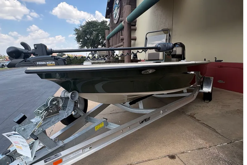 The Image of A 2025 Mako 18 Pro Skiff Backwater Edition on a trailer, ready for the water. - 0