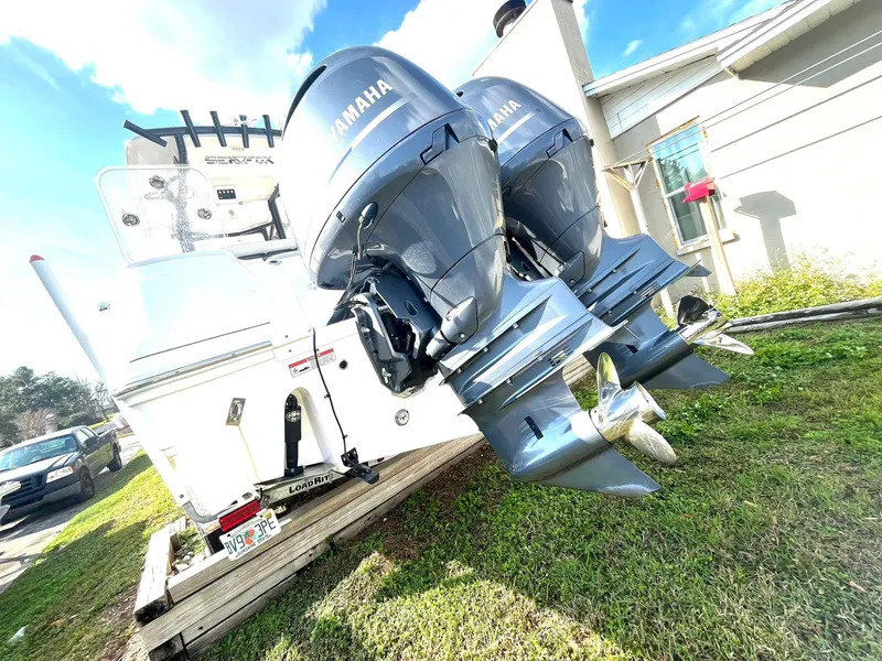 Slide: The Image of 2023 Sea Fox 268 Commander with dual Yamaha outboard motors on a trailer. - 13