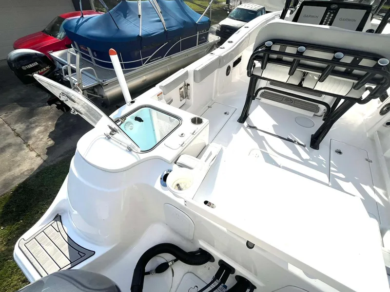 Slide: The Image of 2023 Sea Fox 268 Commander boat interior with seating and storage compartments. - 16