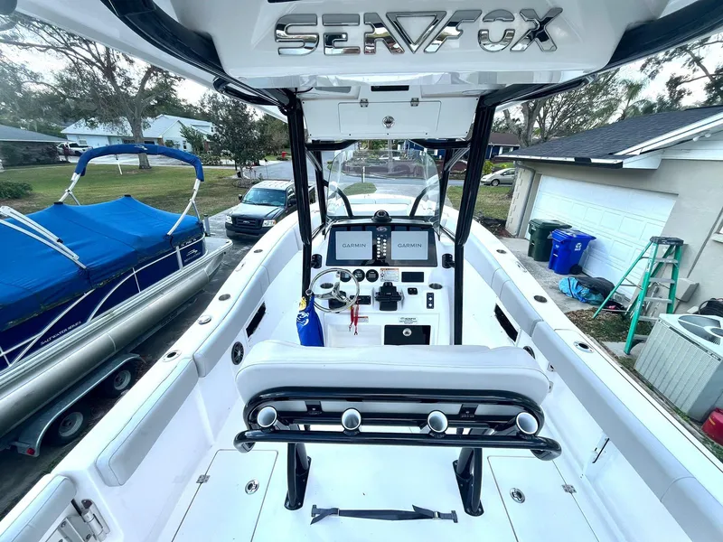 Slide: The Image of 2023 Sea Fox 268 Commander boat interior with modern dashboard and seating. - 20