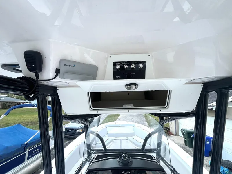 Slide: The Image of 2023 Sea Fox 268 Commander boat console with Garmin electronics and storage compartment. - 27
