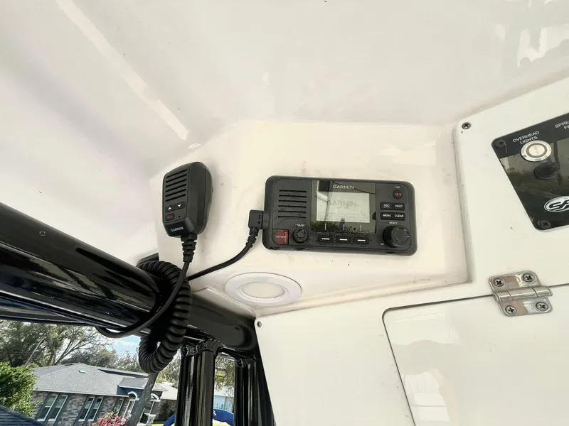 Slide: The Image of 2023 Sea Fox 268 Commander boat radio and microphone setup. - 28