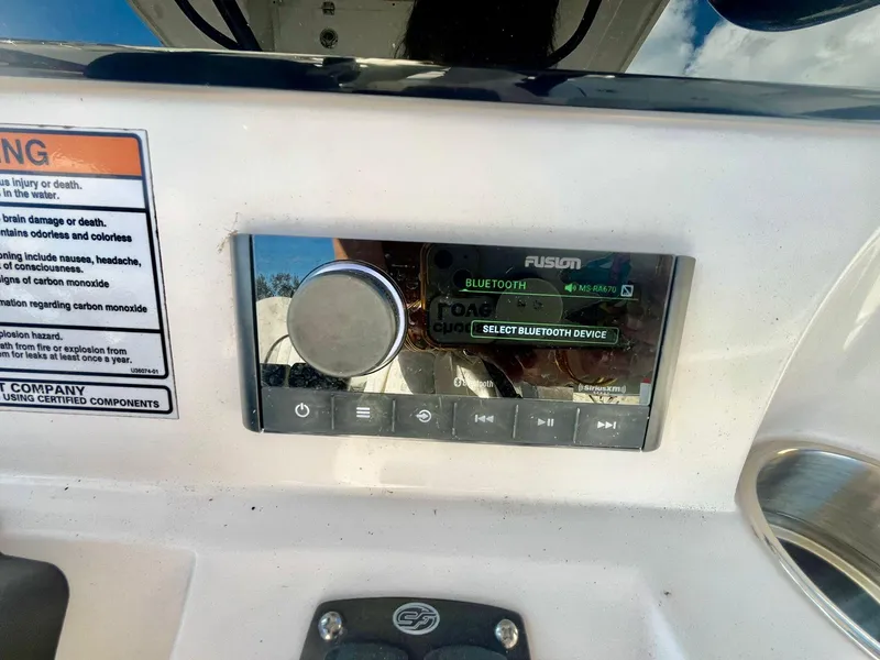 Slide: The Image of Fusion Bluetooth stereo system on 2023 Sea Fox 268 Commander boat dashboard. - 30