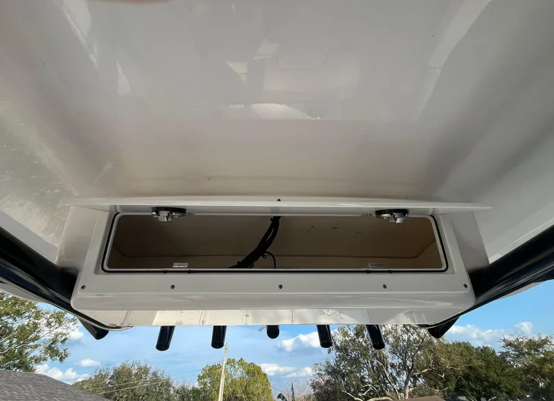 Slide: The Image of Storage compartment on a 2023 Sea Fox 268 Commander boat, open with visible interior. - 31