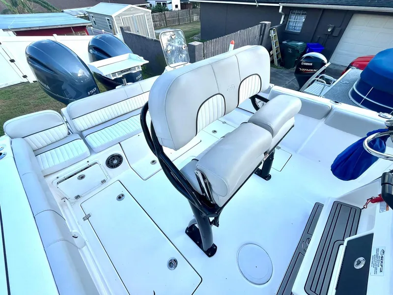 Slide: The Image of 2023 Sea Fox 268 Commander boat interior with dual engines and cushioned seating. - 33