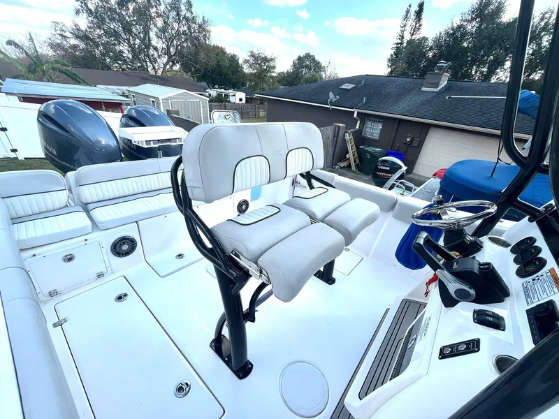 Slide: The Image of 2023 Sea Fox 268 Commander boat interior with dual seats and control panel. - 34