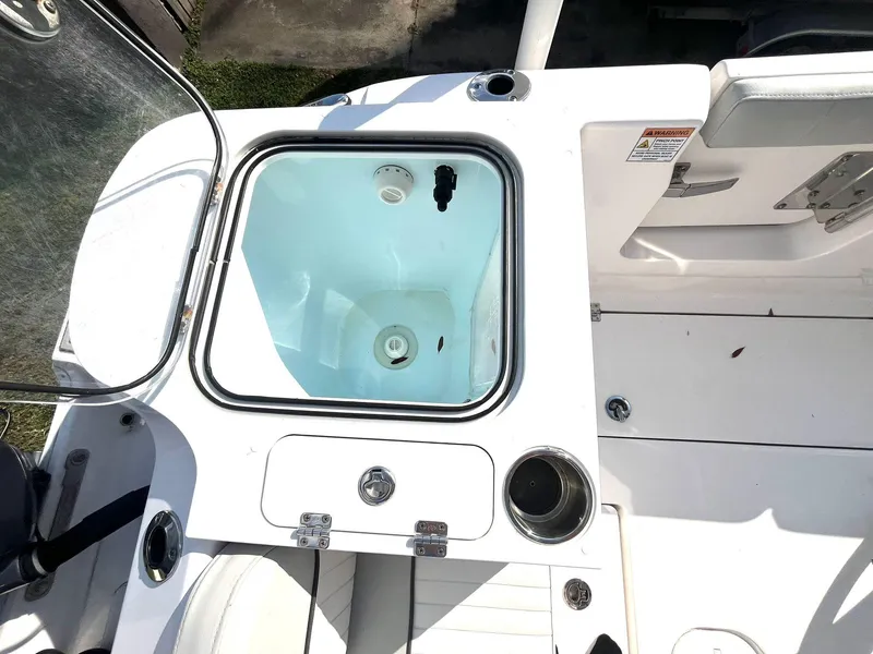 Slide: The Image of 2023 Sea Fox 268 Commander boat interior with open livewell and seating area. - 47