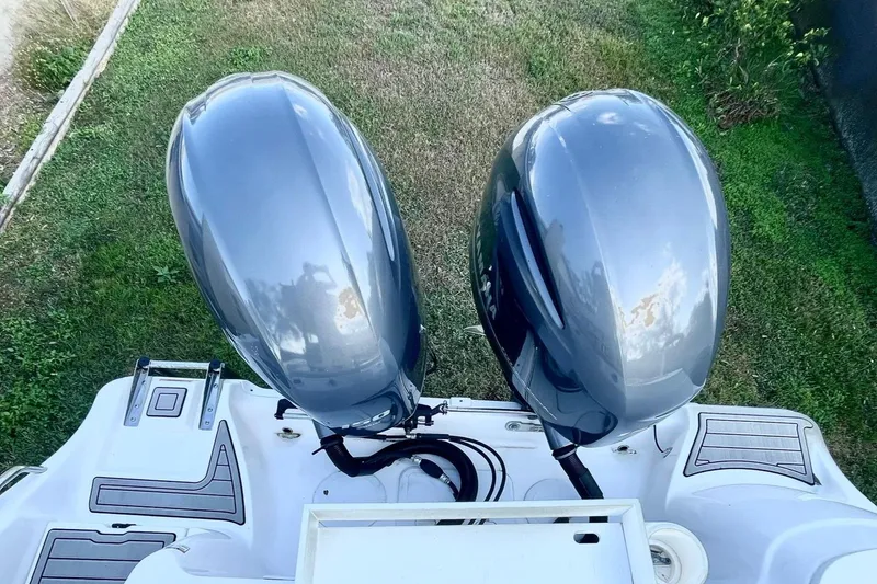 Slide: The Image of Twin outboard motors on a 2023 Sea Fox 268 Commander boat, viewed from above. - 9