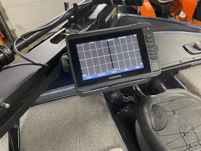 Slide: The Image of Garmin fishfinder on 2023 Nitro Z17 boat dashboard, displaying sonar data. - 7