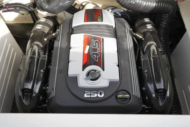 Slide: The Image of 2023 Sea Ray SPX 210 boat engine, featuring a 4.5L 250 horsepower motor. - 14