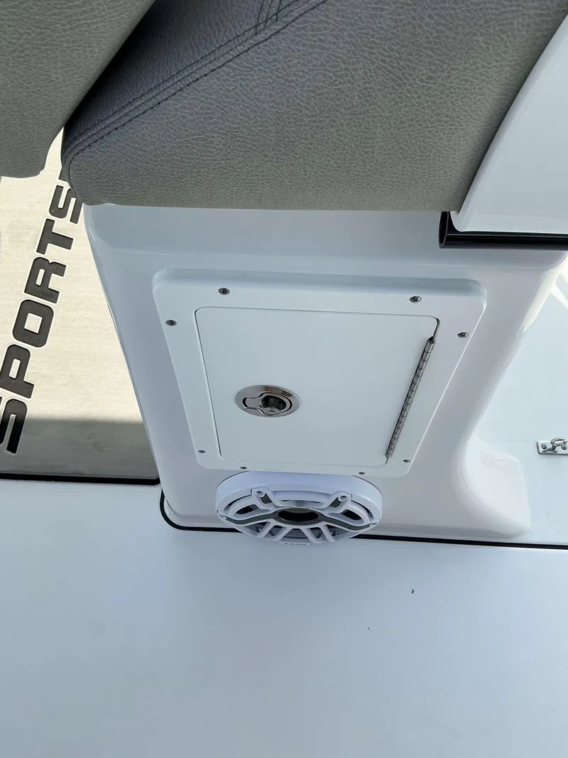 Slide: The Image of 2025 Sportsman 267 Masters boat interior with speaker and storage compartment. - 14